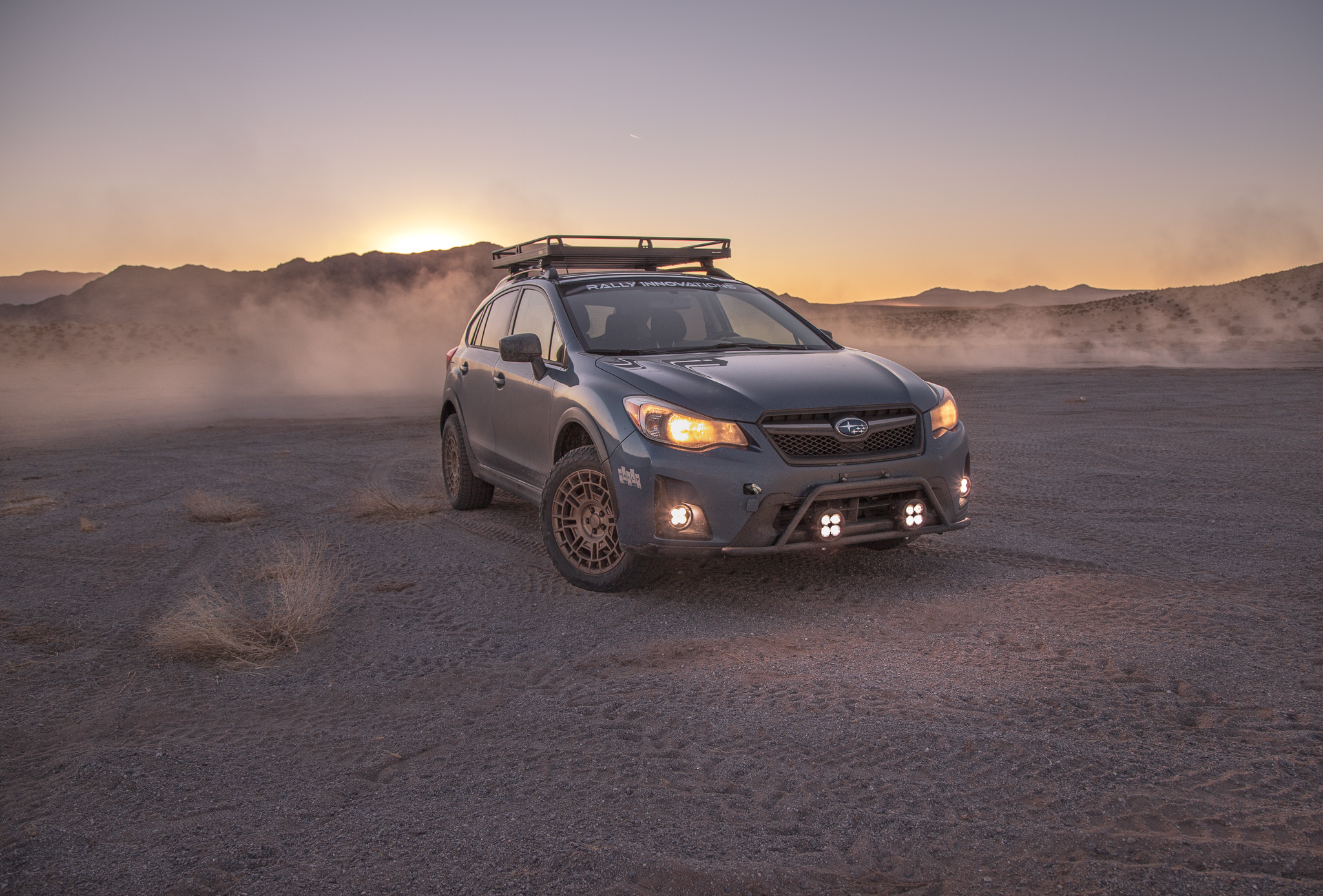 Subaru forester with wild peak all terrain tyres on sand