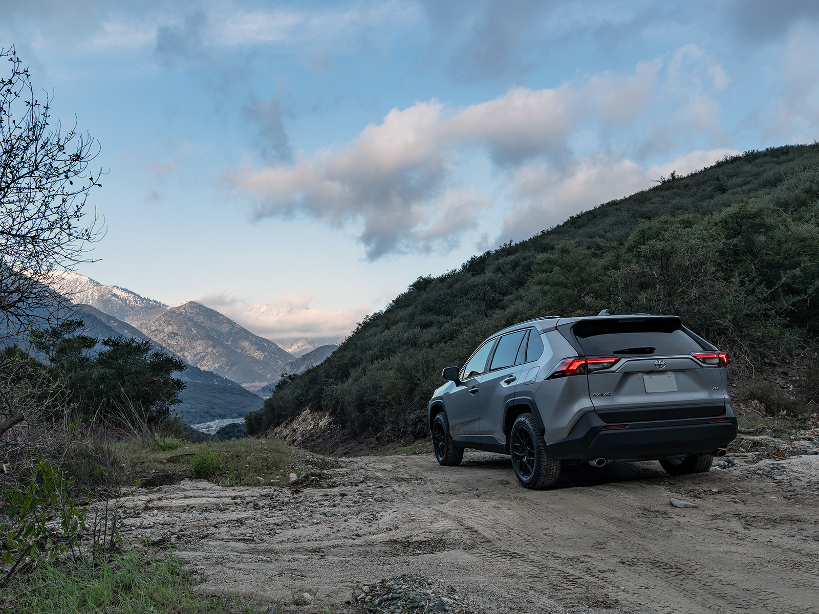 wildpeak all terrain tyres on a new Toyota RAV4 on a dirt mountain road