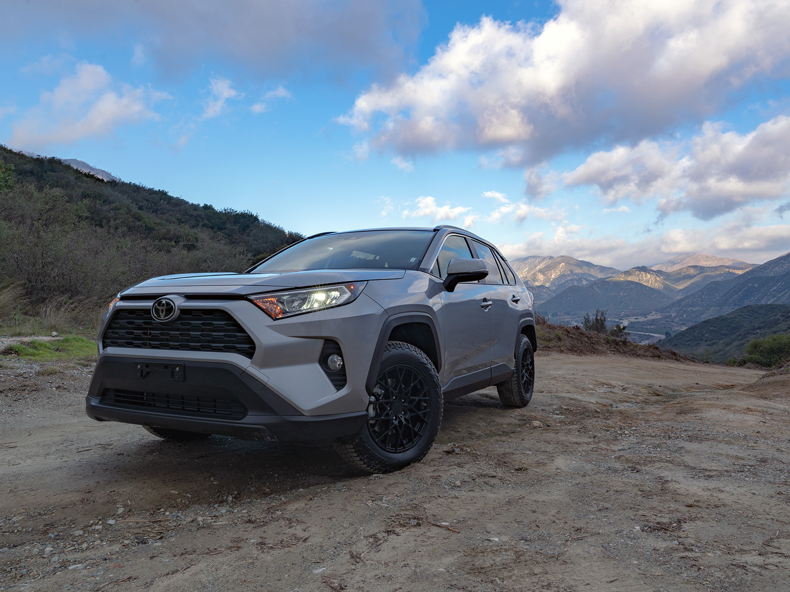 wildpeak all terrain tyres on a new Toyota RAV4 on a dirt mountain road